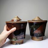A pair of vintage stoneware pots from the 80s-90s with a Japanese style, signed handmade pottery.
