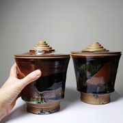 A pair of vintage stoneware pots from the 80s-90s with a Japanese style, signed handmade pottery.