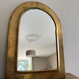 Brass half-moon mirror