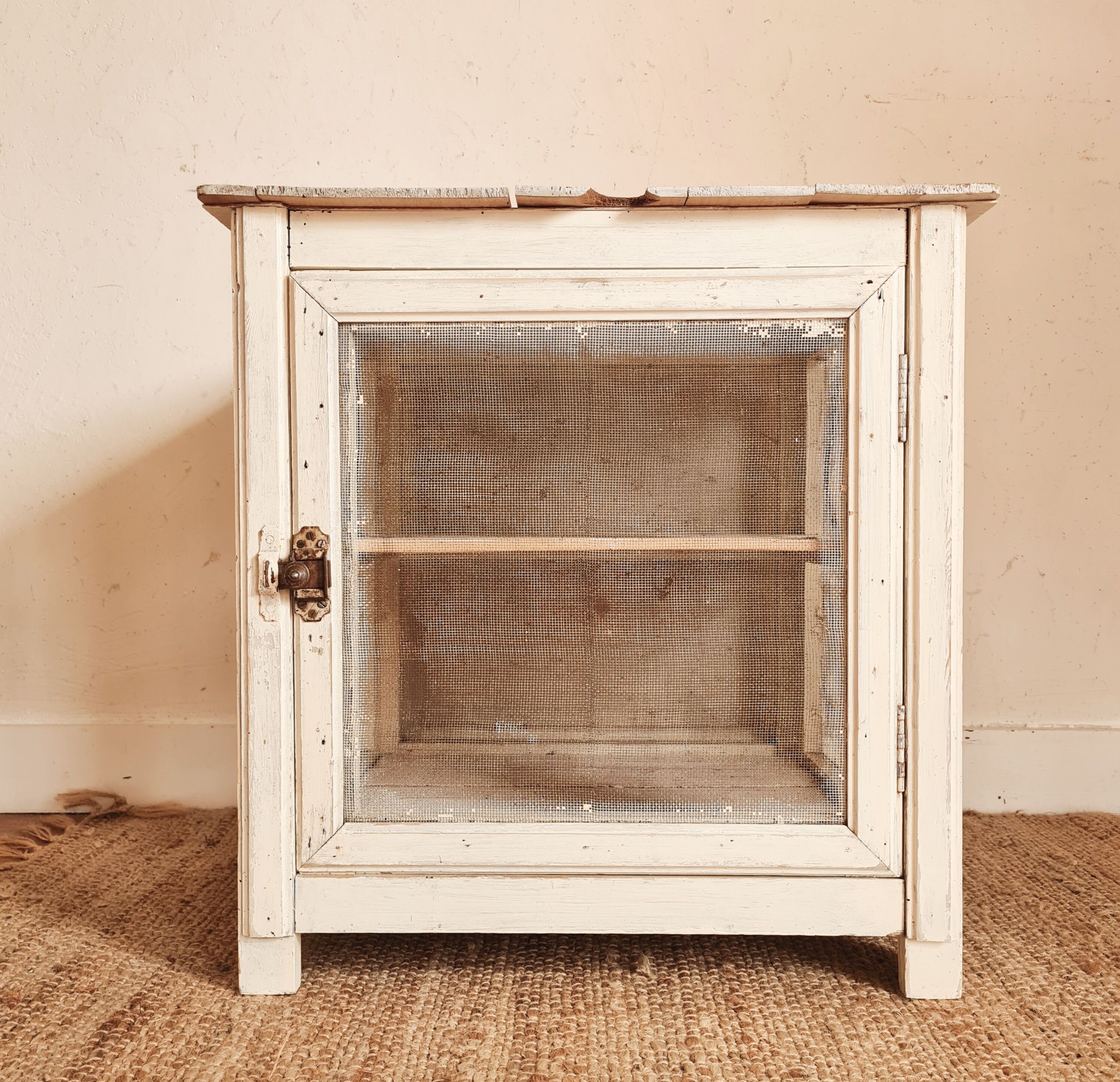 Wooden pantry and white mesh