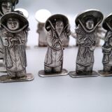 Knife holders and 2 toothpick doors.