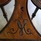 Art nouveau table with a pyrograved decoration