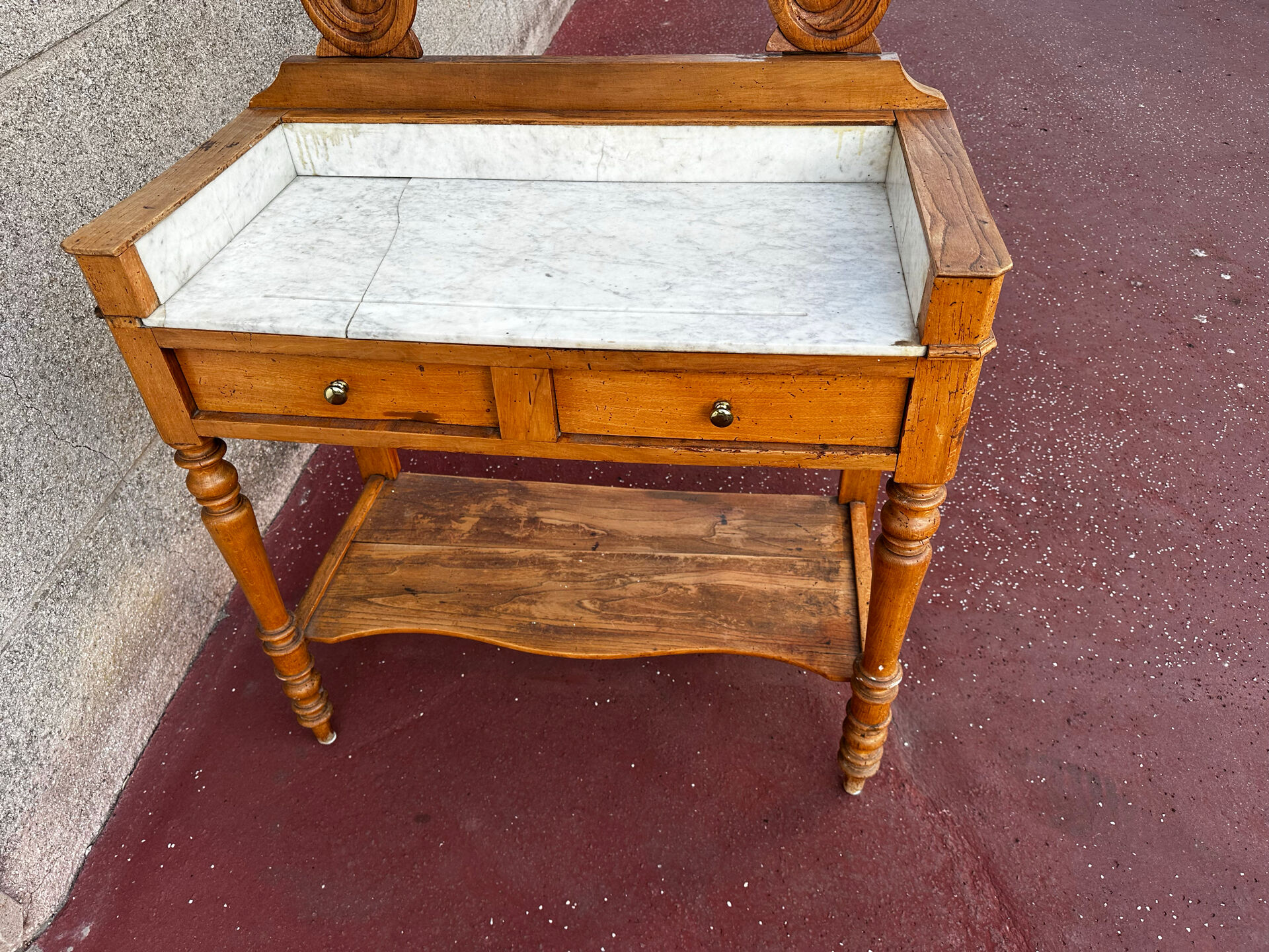 Walnut and marble dressing table, mercury mirror, circa 1850.
