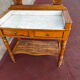 Walnut and marble dressing table, mercury mirror, circa 1850.
