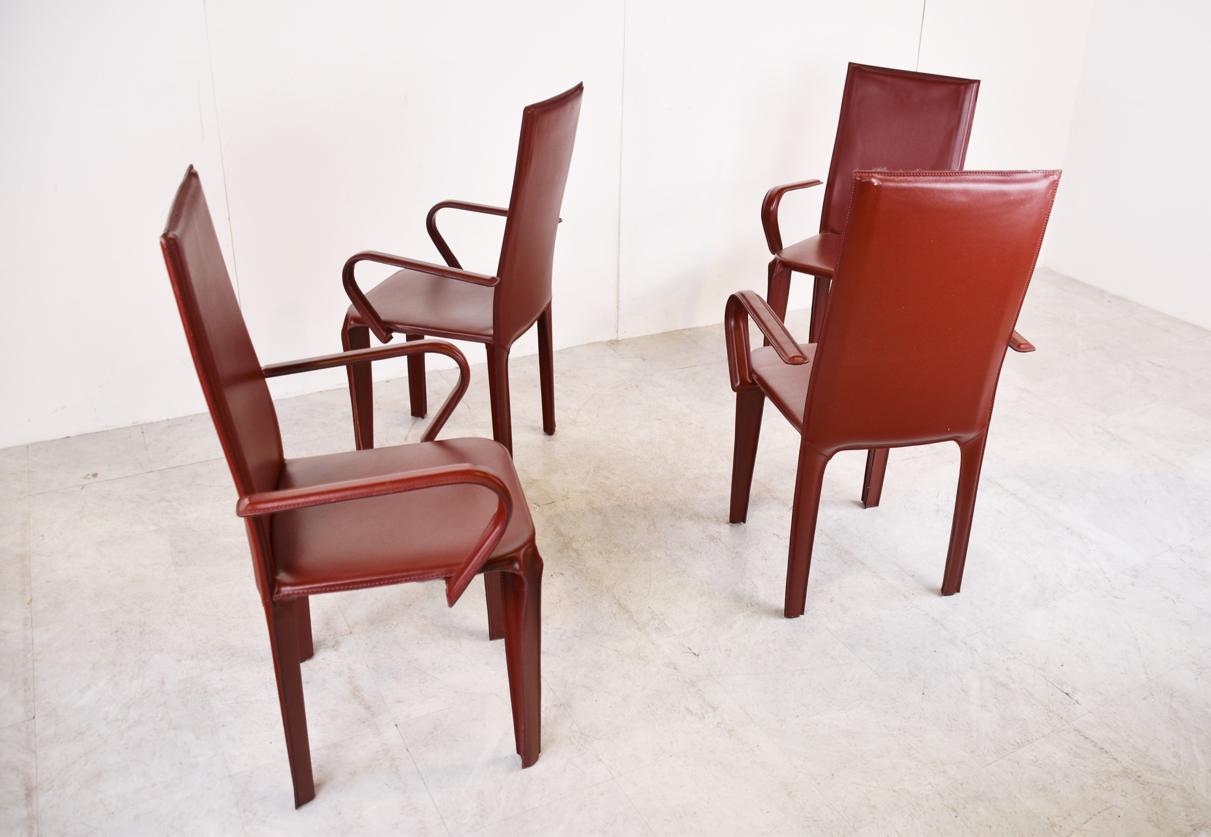 4 red leather dining chairs by Arper italy, 1980s