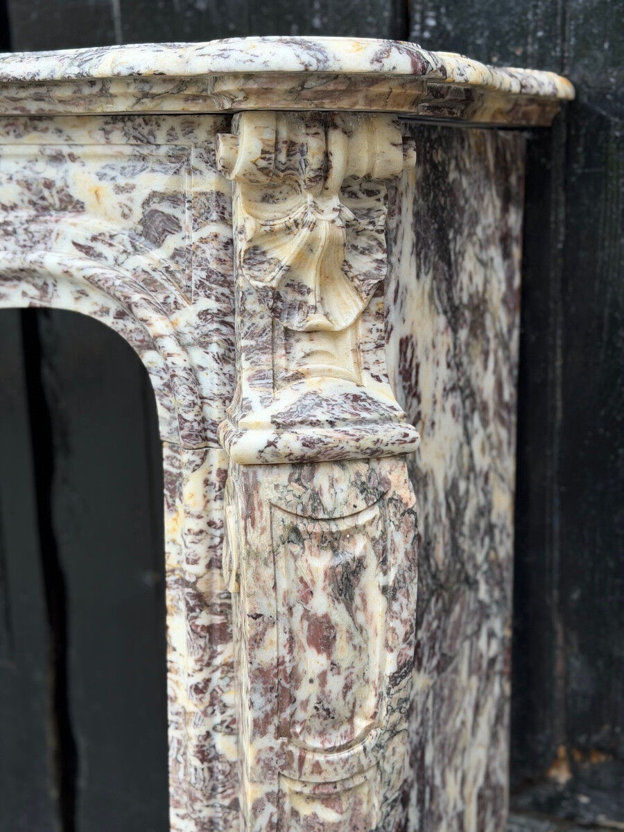 Louis XV style fireplace in Brocatelle marble, circa 1880.