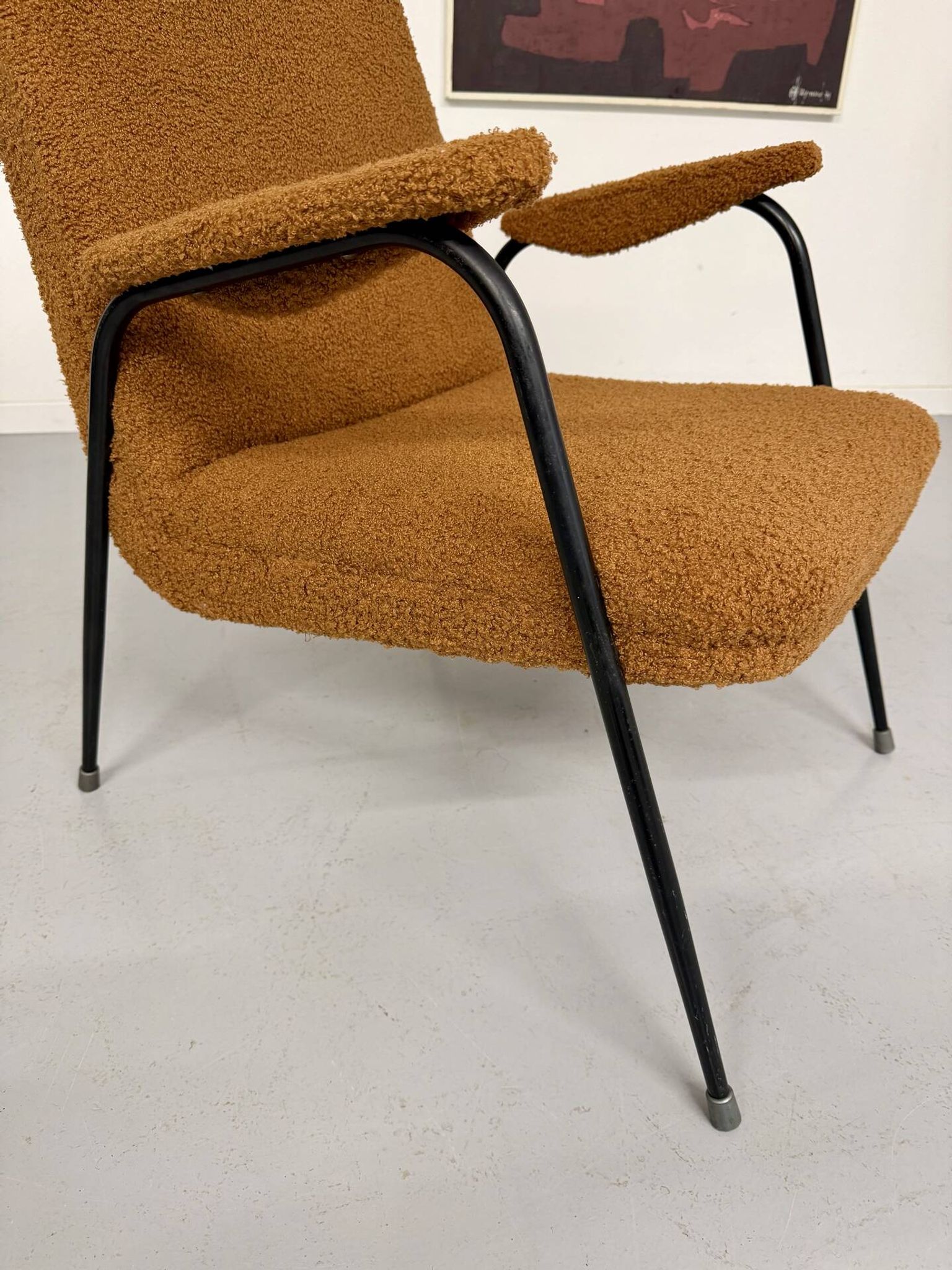 Vintage metal armchair with orange boucle fabric, French design from the 1950s.