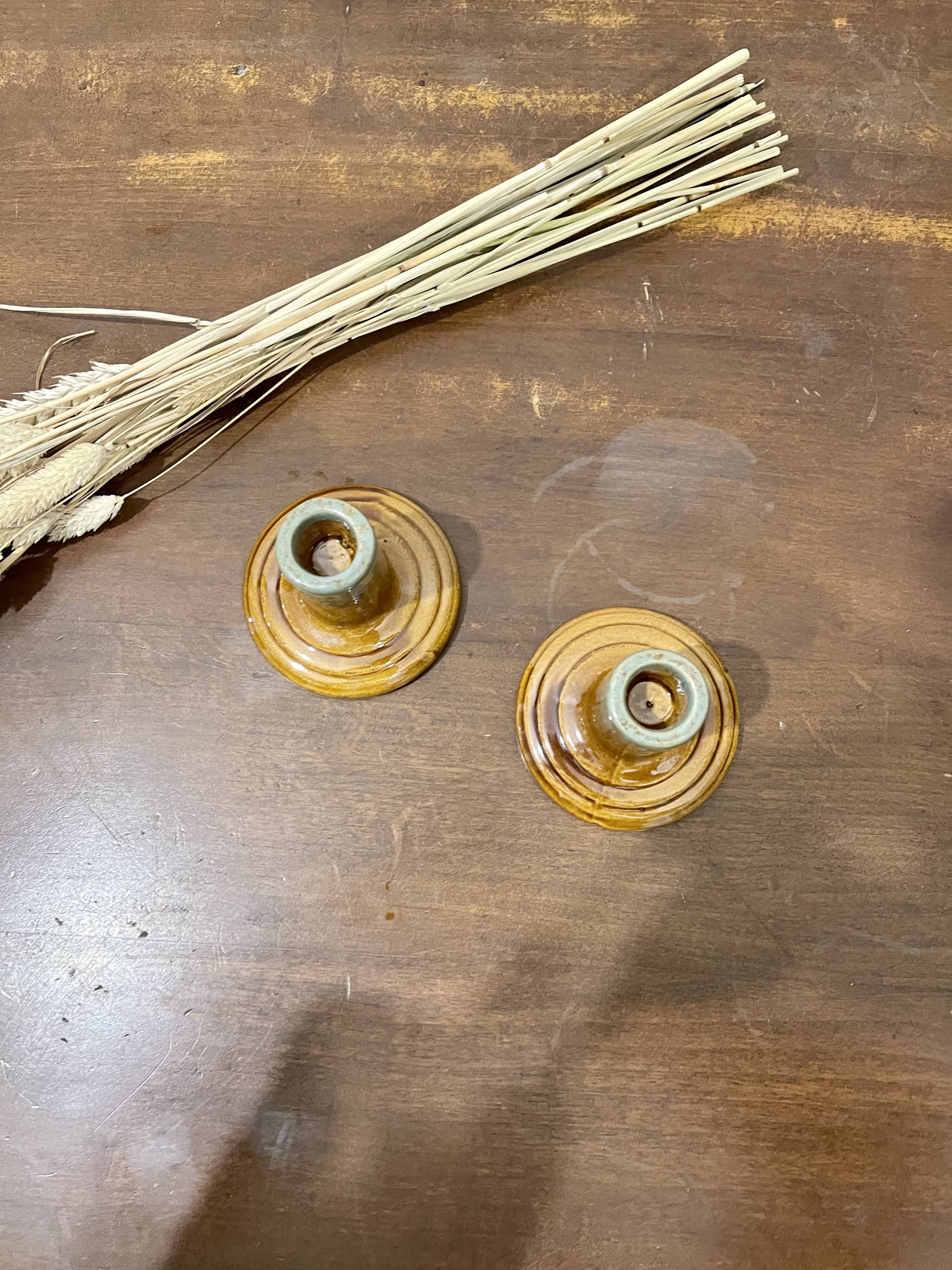 Pair of ceramic candlesticks