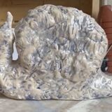 Blue and white ceramic snail