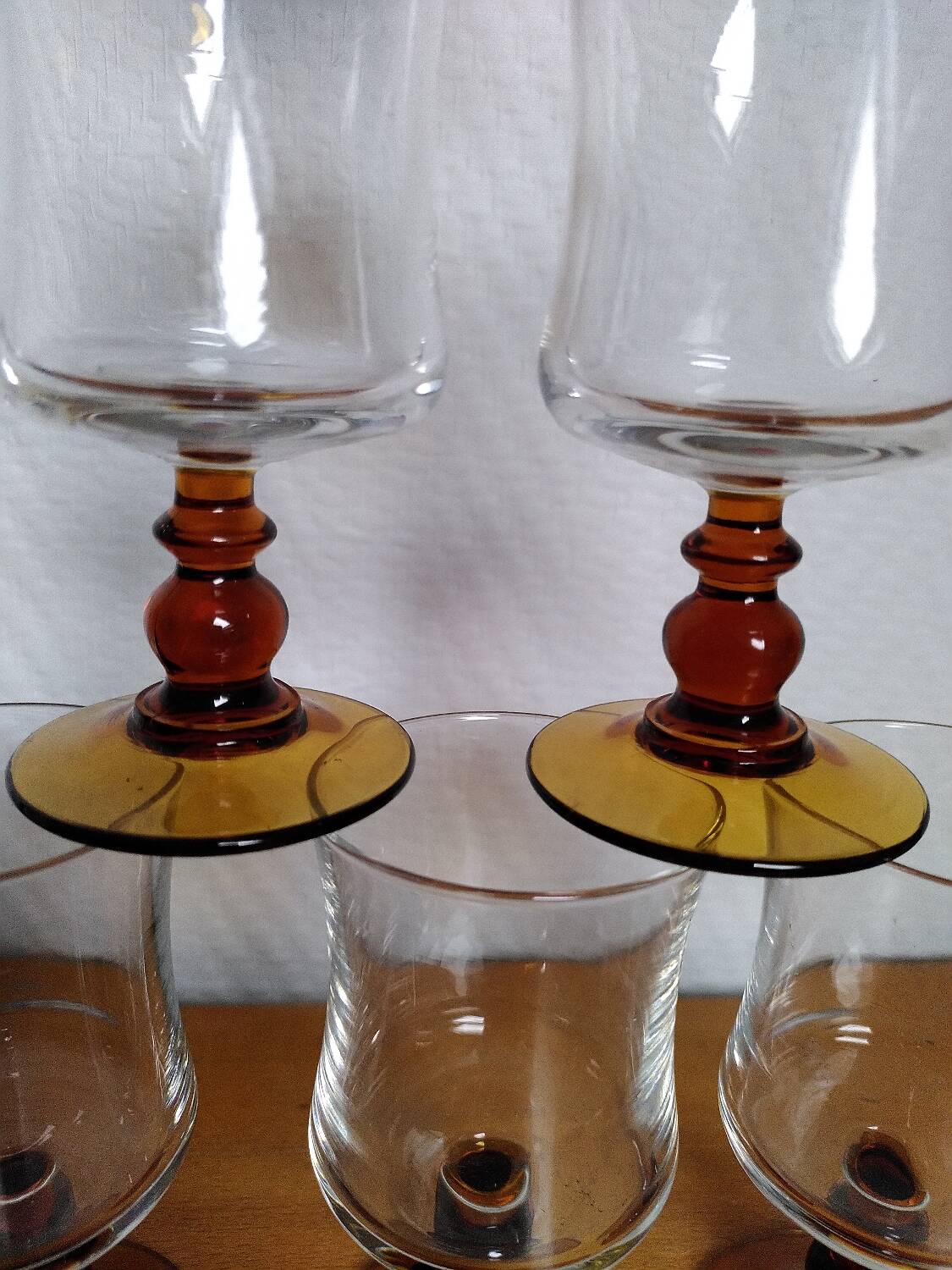 6 amber stemmed glasses