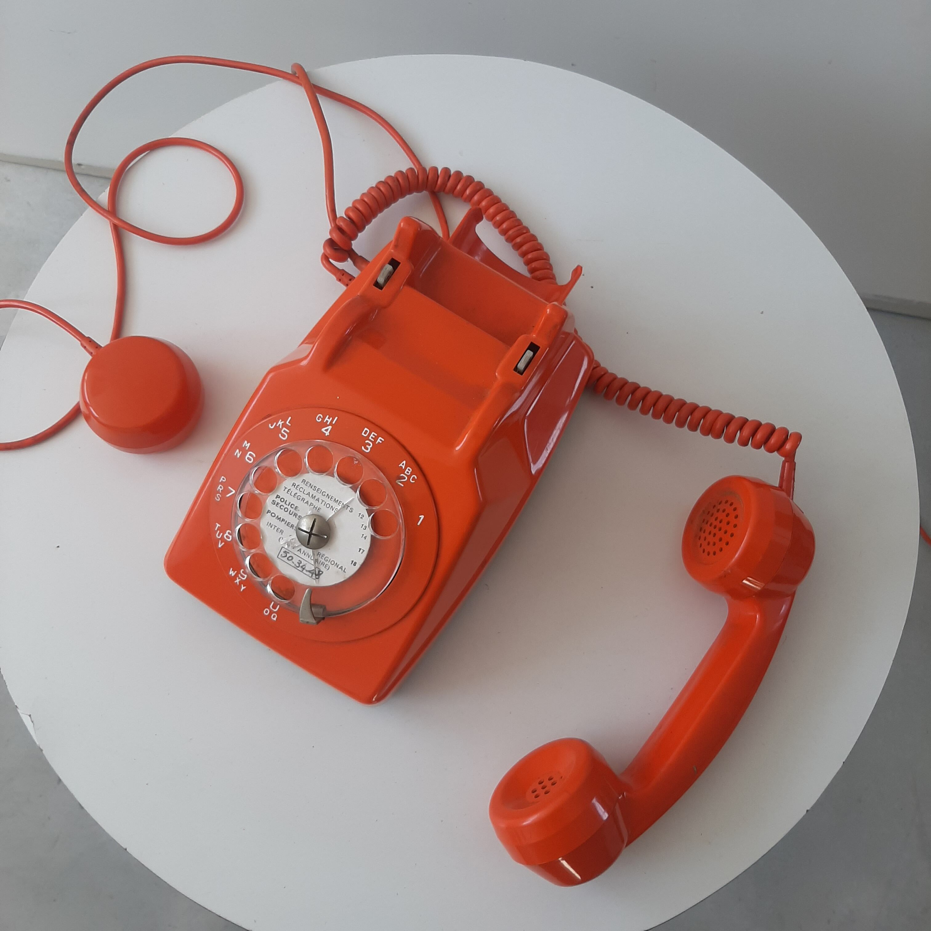Vintage orange dial telephone