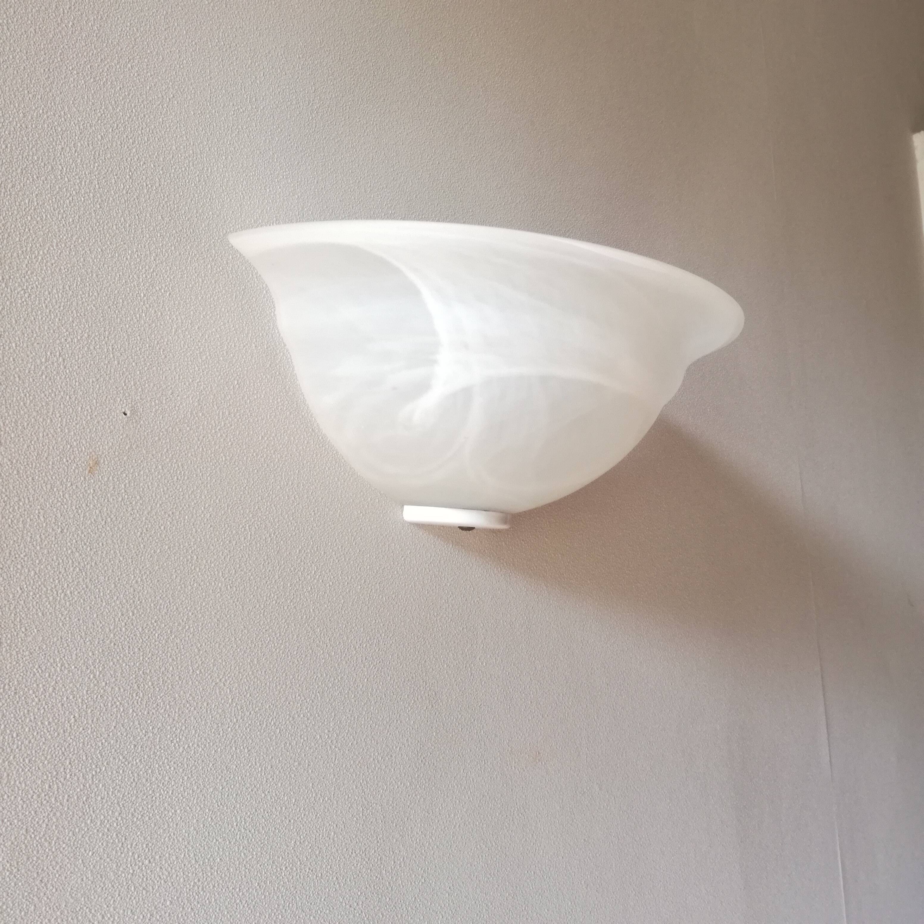 Half bell wall light in milky glass