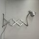 Old large industrial accordion wall lamp