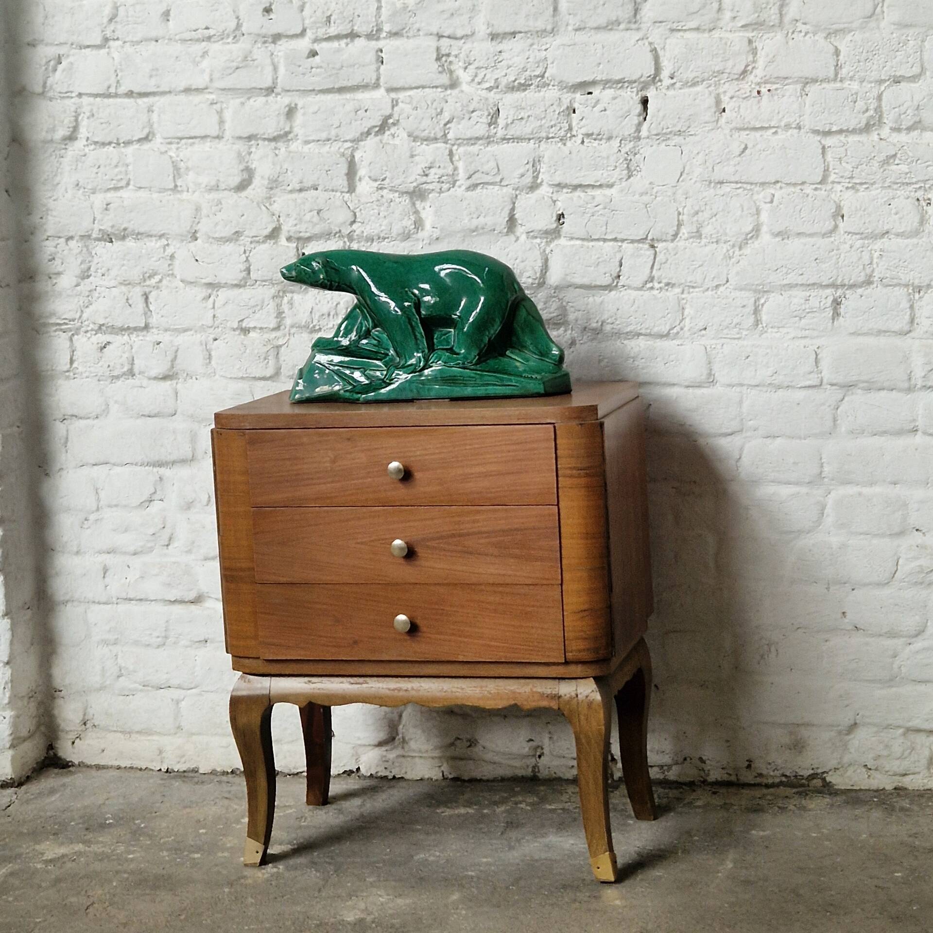Small vintage Art Deco piece with 3 drawers, curved legs and caps.