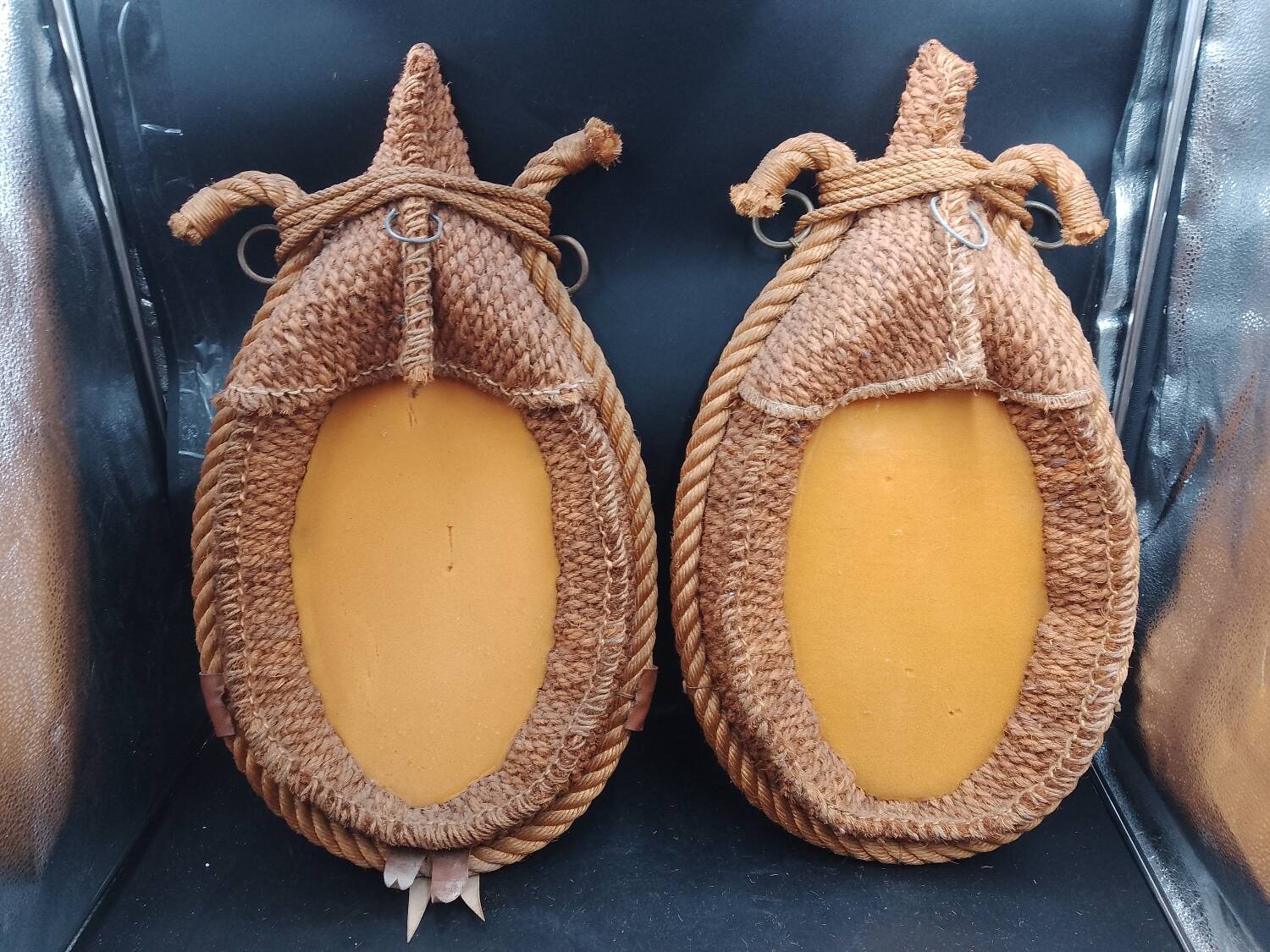 Pair of large oval rope and leather mirrors, very good condition, 1950s