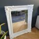 Antique mirror with painted wooden frame
