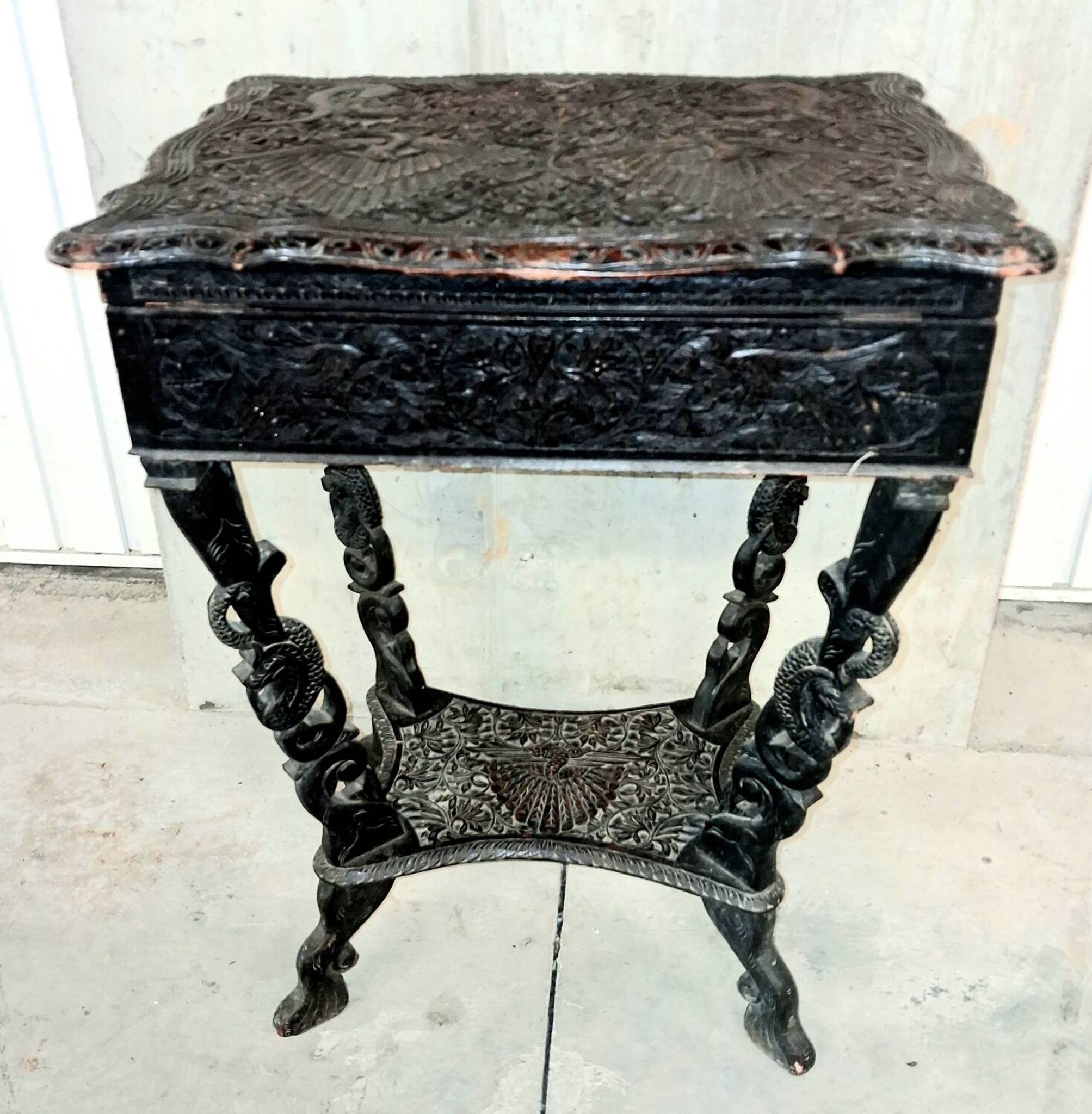 Ethnic carved wooden worker's furniture