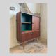 Vintage rosewood veneer top sideboard and dark green interior