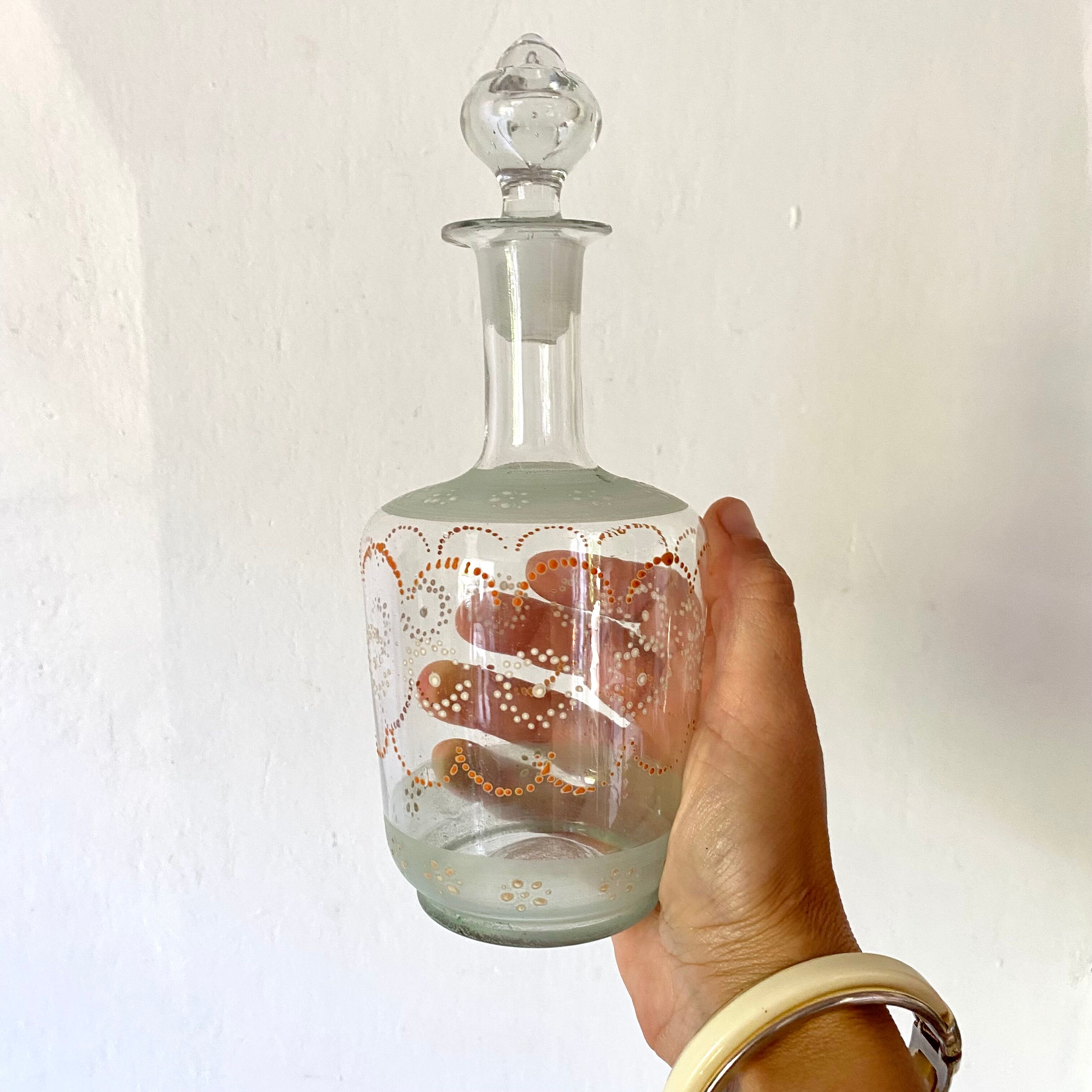 Antique carafe with hand decoration