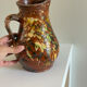 Studio ceramic pitcher with sprayed glazes – circa 1960-70