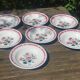 Lot of seven old soup plates from the 40s/50s decorated with roses