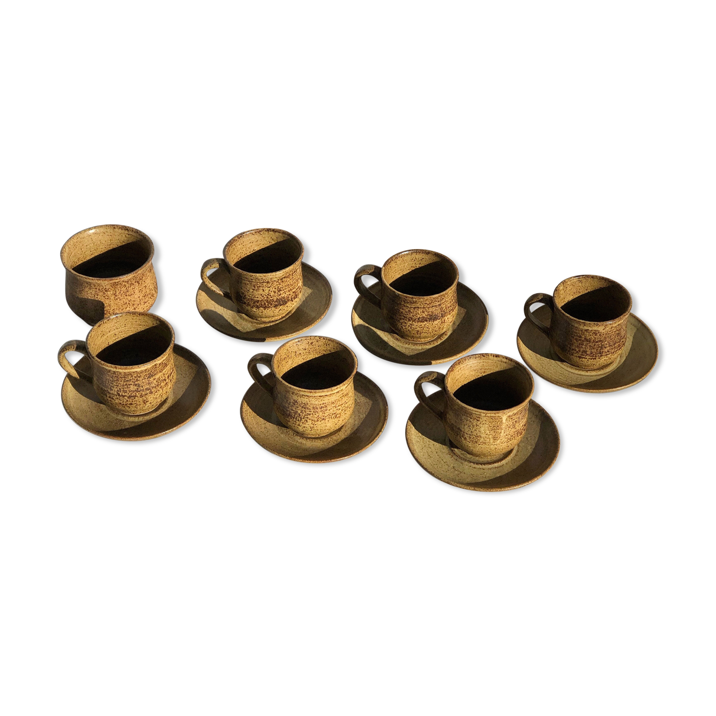 Set cups under sandstone cups