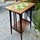 Art Nouveau side table 1910 with double tops in dark oak.