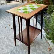 Art Nouveau side table 1910 with double tops in dark oak.