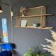 Steel and wicker wall shelf