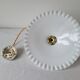 Serrated opaline suspension