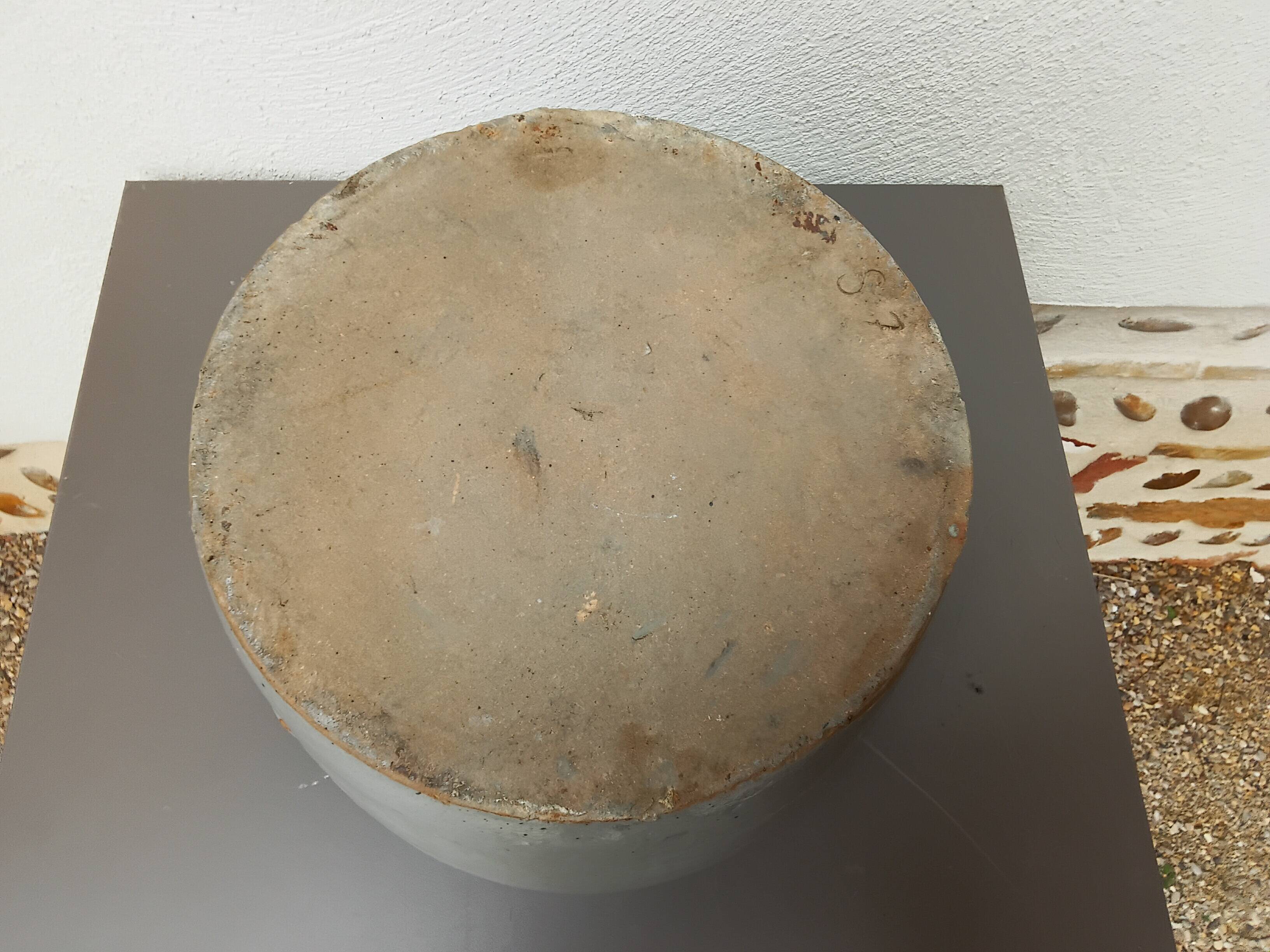 Beige enameled stoneware pot