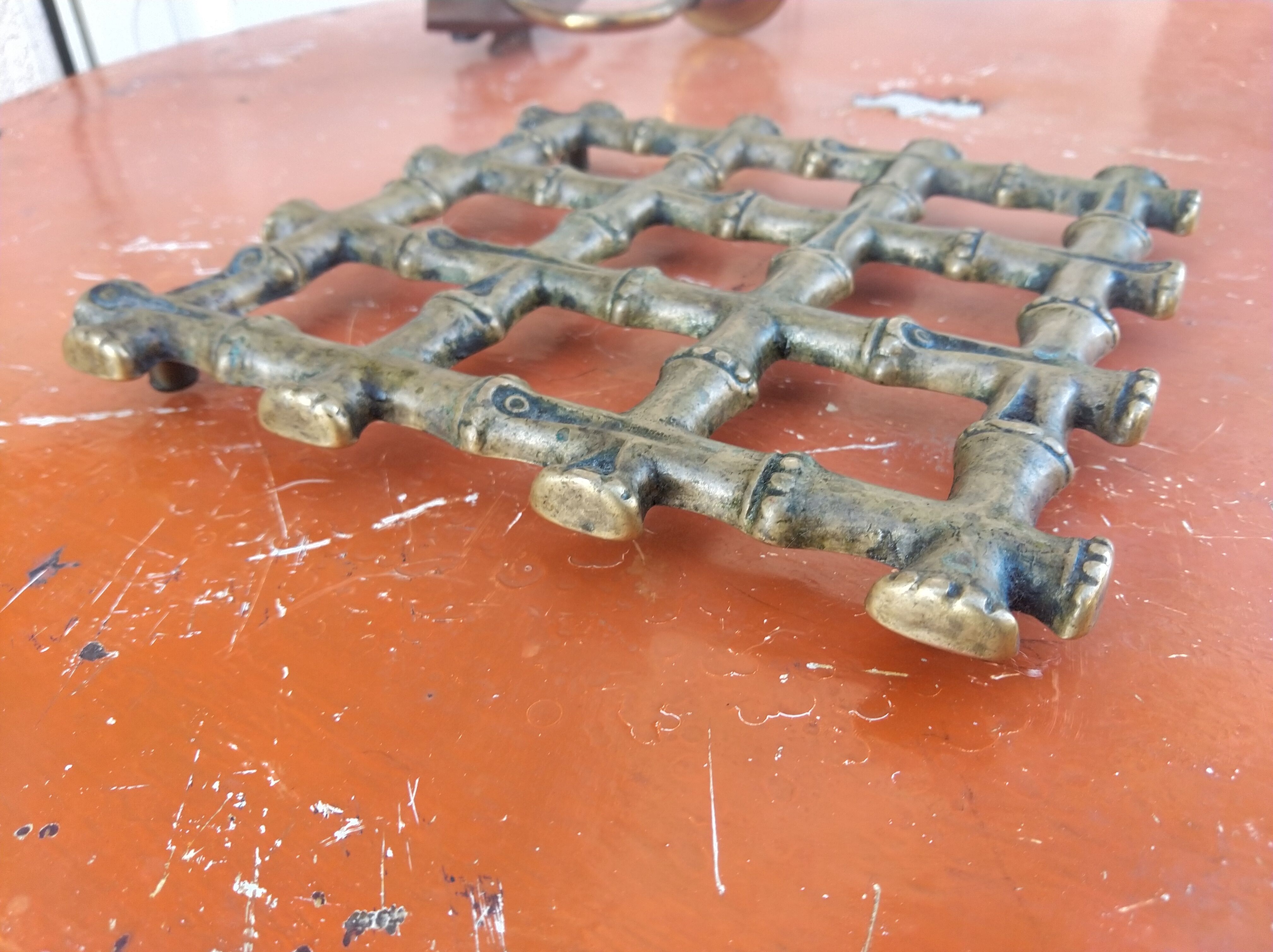 Bronze trivet in the style of bamboo, circa 1960