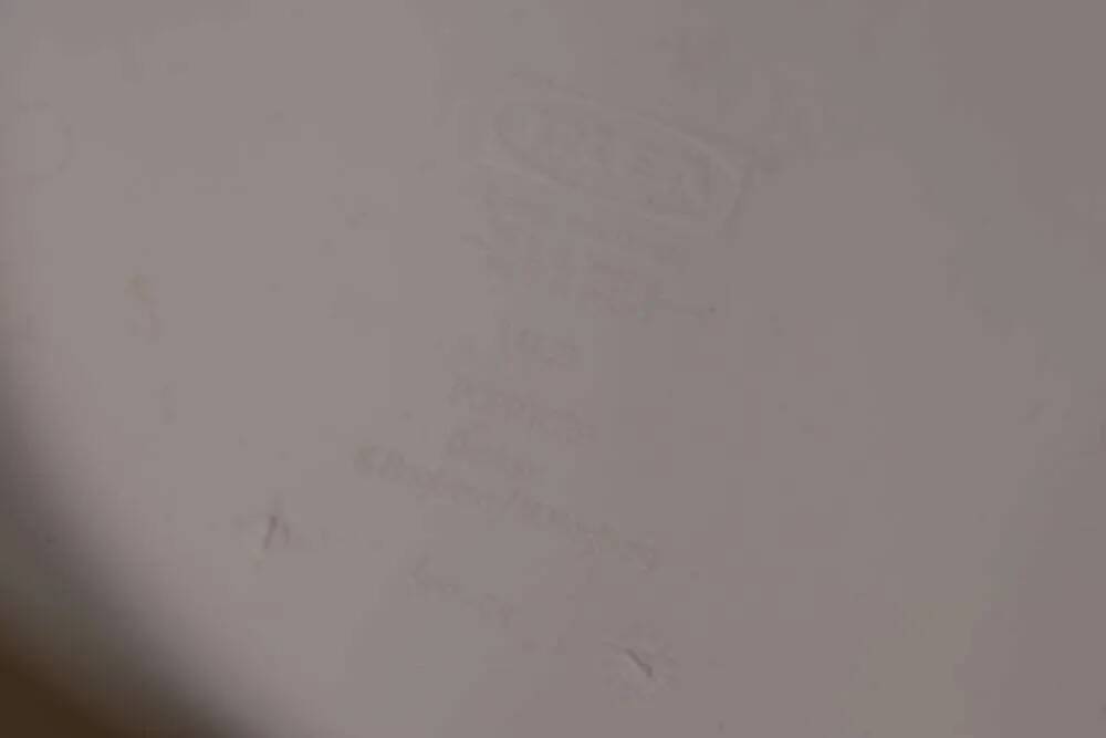 Space-age shell chair with storage, Ikea Popptorp chair.