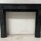Napoleon III period fireplace with a black marble corbel. 19th century.