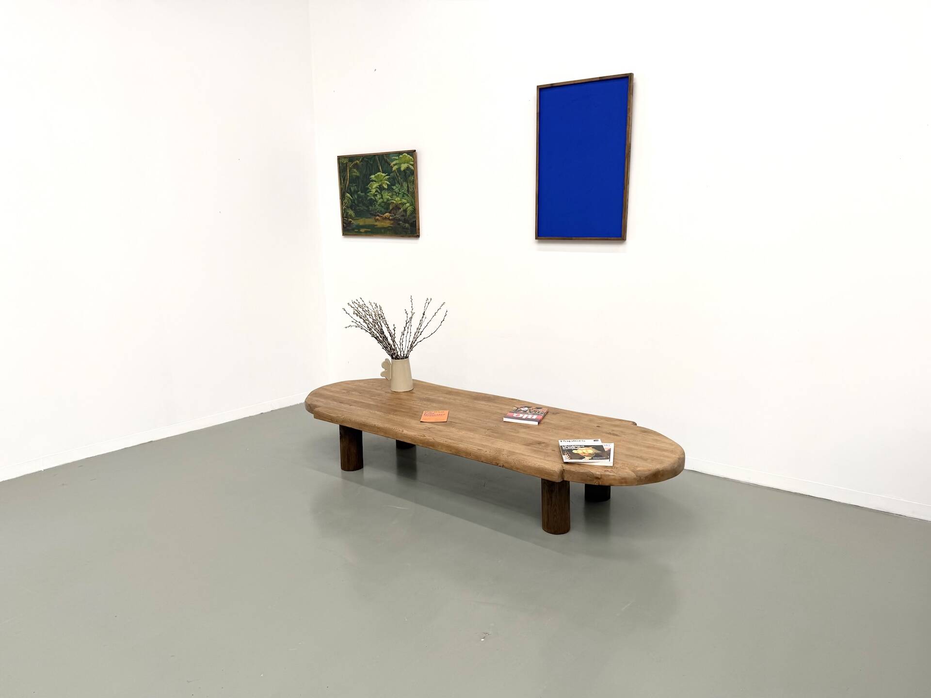 XXL oval coffee table in solid oak, cylindrical base, 1950s.