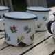 Enamelled sheet metal cups