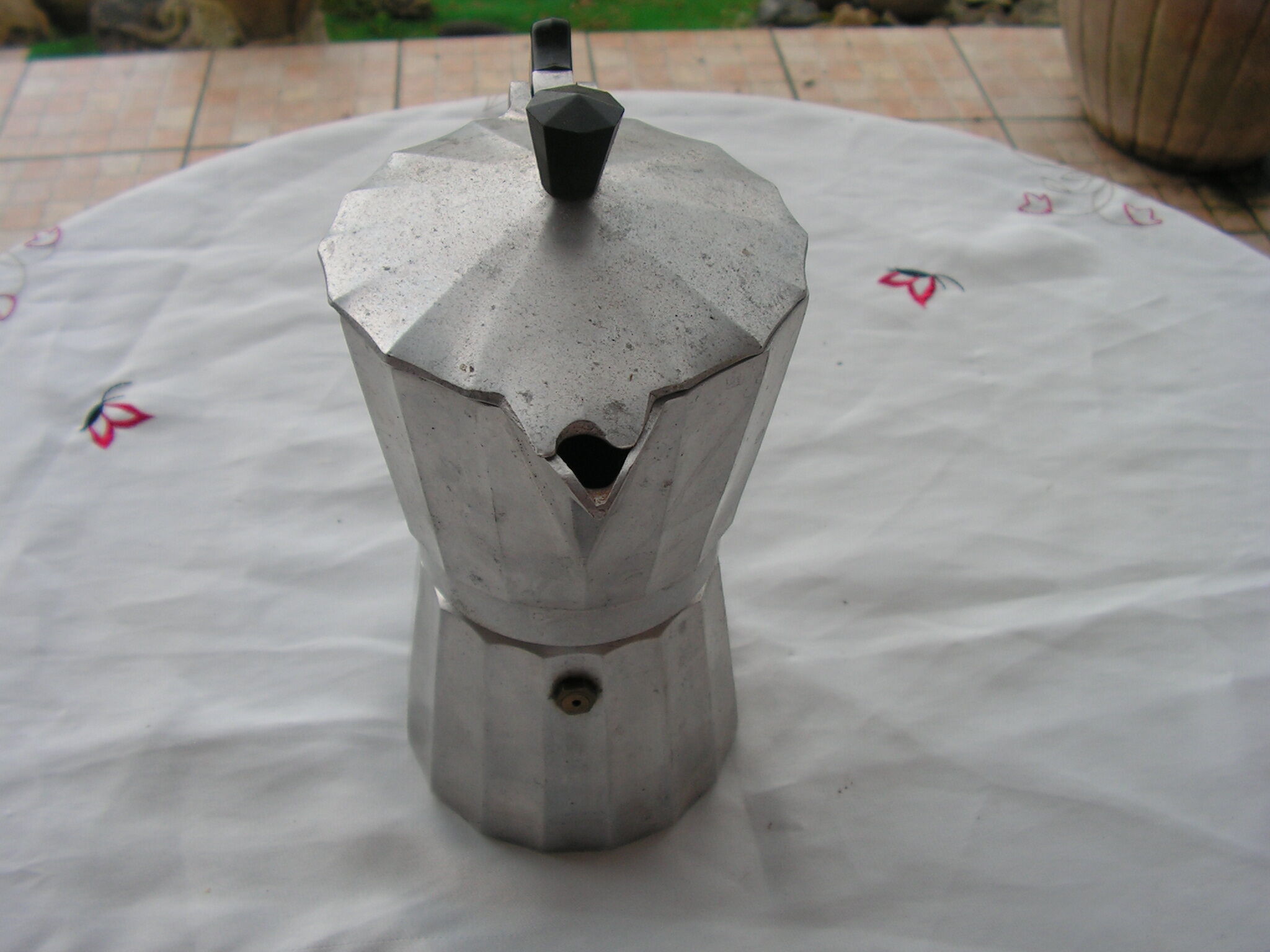 Italian coffee maker in aluminum grip in bakelite