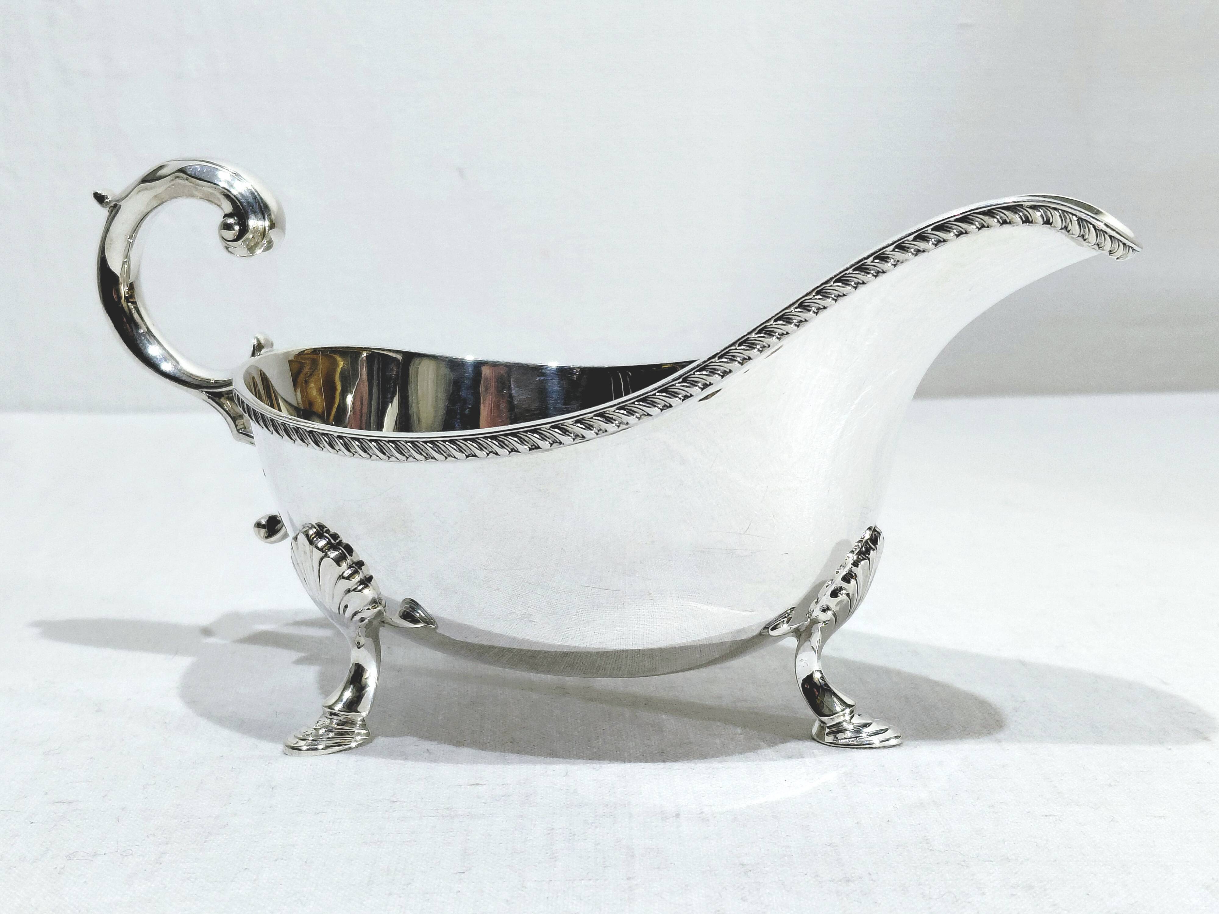 Silver sauceboat, England