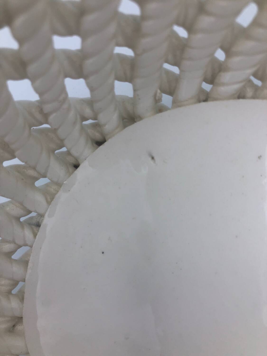 Woven ceramic basket