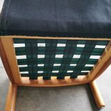 Pair of designer leather armchairs 80s
