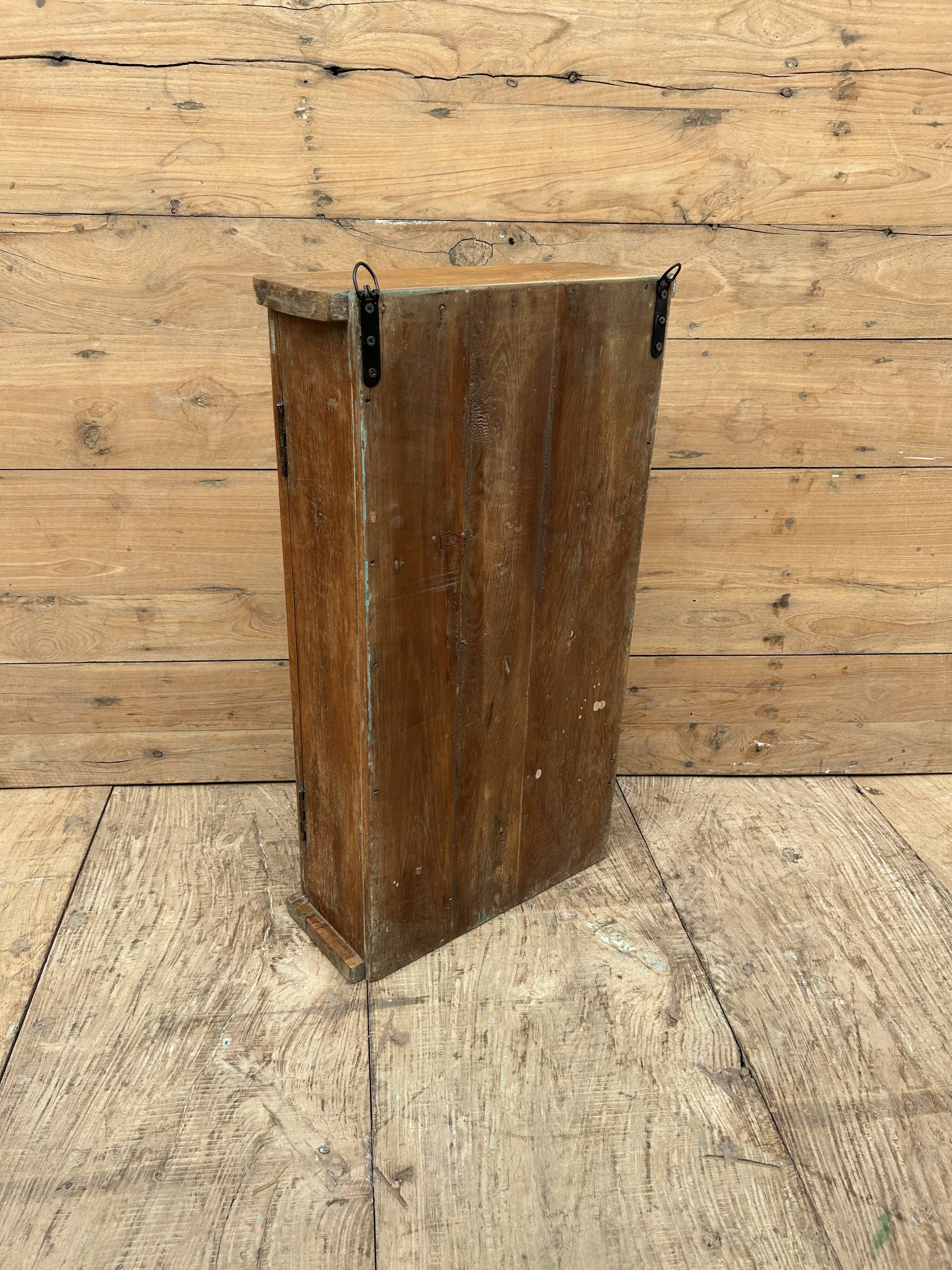 Wall display cabinet in Burmese teak
