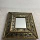 Eglomisé mirror with wooden parecloses