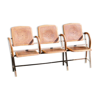 Row of theater folding seats, early twentieth century