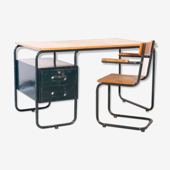 Desk with bauhaus style tubular steel chair