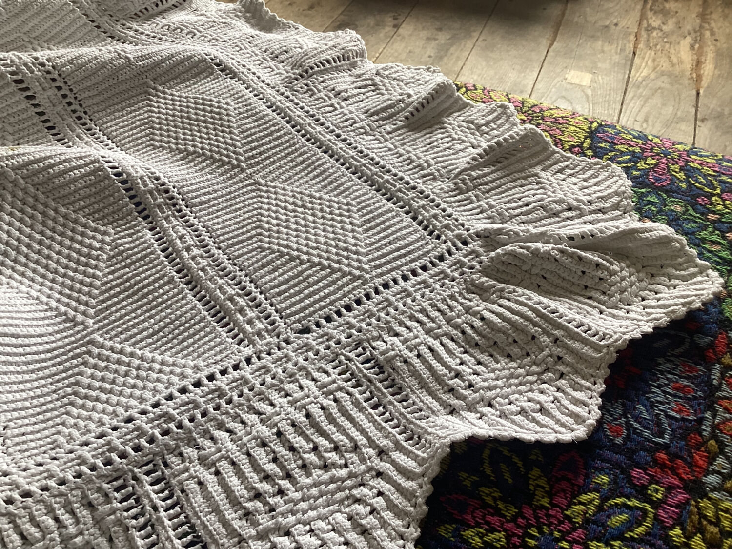 White cotton crochet bed cover with diamond bands