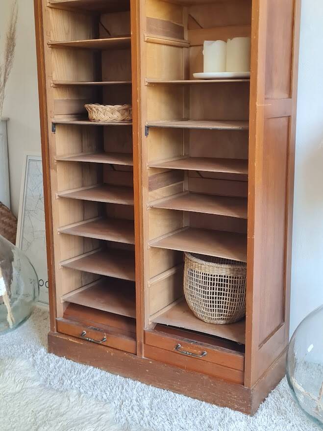 Vintage double curtain filing cabinet.