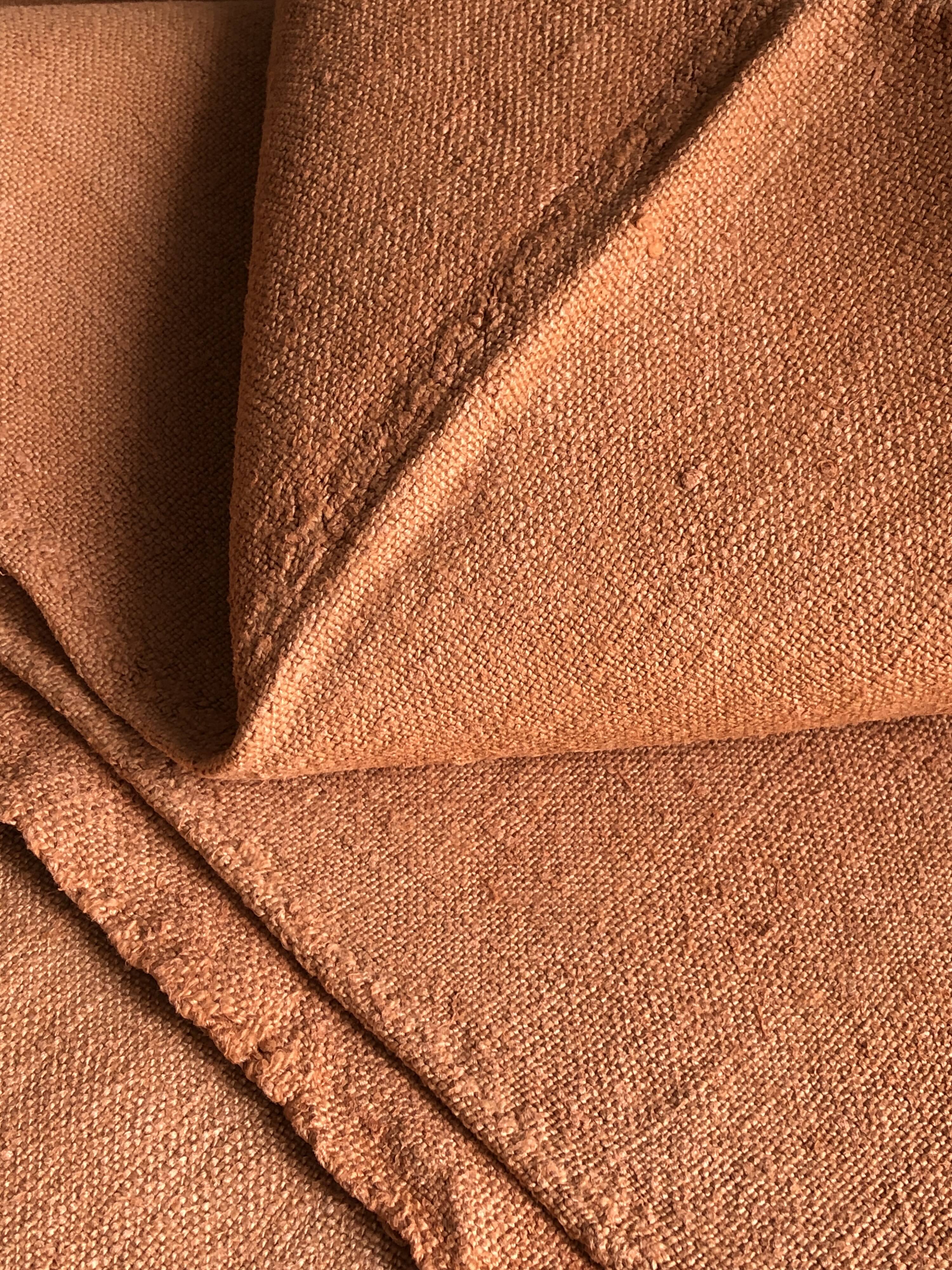 Old harvest tablecloth in terracotta tinted hemp