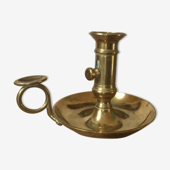 Thumb brass candlestick