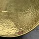 Vintage hammered brass log holder