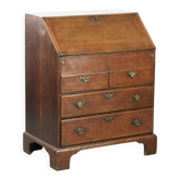 Antique English oak secretary from the 18th century with a stepped interior